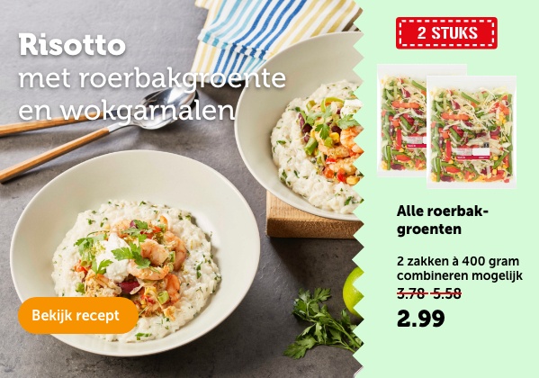 Risotto met roerbakgroente en wokgarnalen. Bekijk recept.