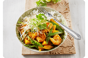 Gele curry met mango en garnalen 🥭